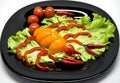 Vegetables on a plate laid out in the shape of a scorpion