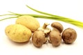 Vegetables: potatoes, mushrooms, green onions isolated