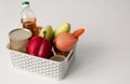 Set of vegetables for proper nutrition in a basket on the table