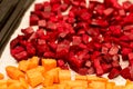 Vegetables - pumpkin and beetroot - on a tray prepared for roasting in the oven Royalty Free Stock Photo