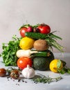 Vegetables Pyramid of Tomatoes Lemon Cucumber on Grey Background Overhead Shot Royalty Free Stock Photo
