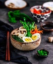 Vegetables ramen soup in ceramic bowl. .style vintage