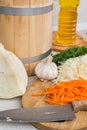 Vegetables are ready for pickling. shredded cabbage carrots and a wooden barrel Royalty Free Stock Photo