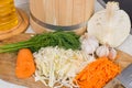 Vegetables are ready for pickling. shredded cabbage carrots and a wooden barrel Royalty Free Stock Photo