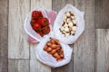 Vegetables in reusable eco friendly mesh bags on bright retro background. Zero waste shopping. Ecological concept. Stop pollution