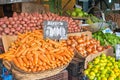 Vegetables and salad in baskets at a market