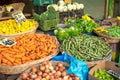 Vegetables and salad in baskets at a market