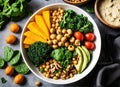 Vegetables salad. Healthy vegan lunch bowl with mushrooms, avocado, broccoli, spinach, chickpeas, pumpkin on a wooden table