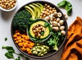 Vegetables salad. Healthy vegan lunch bowl with mushrooms, avocado, broccoli, spinach, chickpeas, pumpkin on a wooden table