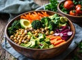 Vegetables salad. Healthy vegan lunch bowl with mushrooms, avocado, broccoli, spinach, chickpeas, pumpkin on a wooden table