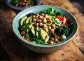 Vegetables salad. Healthy vegan lunch bowl with mushrooms, avocado, broccoli, spinach, chickpeas, pumpkin on a wooden table