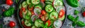 Vegetables Salad, Vegan Plate of Fresh Sliced Cucumbers, Green Onions, Radish, Cherry Tomatoes Royalty Free Stock Photo