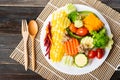 Vegetables salad with wooden spoon and fork Royalty Free Stock Photo