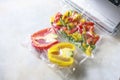 Vegetables in sealed vacuum packing bags. Su-video cooking. Royalty Free Stock Photo