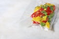 Vegetables in sealed vacuum packing bags. Su-video cooking Royalty Free Stock Photo