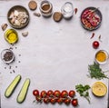 Vegetables seasonings, frame laid out on a white wooden background top view Royalty Free Stock Photo