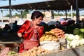 Vegetables seller at Siab bazaar. Samarkand. Uzbekistan Royalty Free Stock Photo