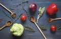 Vegetables, spices, wooden spoons, Royalty Free Stock Photo