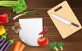 Vegetables on the table with paper and a knife on a cutting board Royalty Free Stock Photo