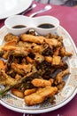 Vegetables in tempura with a bowl of soy sauce Royalty Free Stock Photo