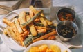 Vegetables in tempura and French fries