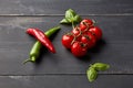 Ingredients for chili sauce on dark wooden background Royalty Free Stock Photo