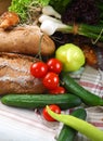 Vegetables and two brads on a table Royalty Free Stock Photo