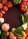 Vegetables on wood background with space for recipe.