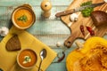 Vegetarian autumn pumpkin cream soup. Pumpkin soup with spices on a wooden table