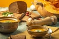 Vegetarian autumn pumpkin cream soup. Pumpkin soup with spices on a wooden table