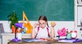 Vegetarian. back to school. Einstein. digital age with modern technology. small girl ready to eat apple. Smart child Royalty Free Stock Photo