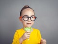 Vegetarian beautiful cute little girl eating salad. Concept of healthy food. Royalty Free Stock Photo