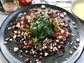 Vegetarian Beetroot Carpaccio Salad with Olive Oil, Goat Cheese, Pine Nuts, Sprouts and Arugula Rocket Leaves / Rucola or Beet Royalty Free Stock Photo