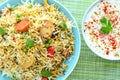 Vegetarian biryani or vegetarian pilaf served with yogurt dip or raita Royalty Free Stock Photo