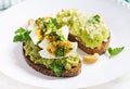 ndwich with avocado puree, boiled eggs and sandwich cream cheese, kiwi, nuts. Royalty Free Stock Photo