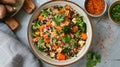 Vegetarian buddha bowl with quinoa, sweet potatoes, tofu, and fresh vegetables Royalty Free Stock Photo