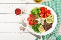 Vegetarian Buddha bowl with quinoa, tofu cheese and fresh vegetables. Royalty Free Stock Photo