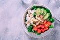 Vegetarian buddha bowl. Raw vegetables and tuna in a one bowl Royalty Free Stock Photo