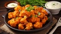 Vegetarian Buffalo Cauliflower Bites. Cauliflower buffalo wings with celery. AI Generative Royalty Free Stock Photo