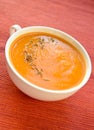 Vegetarian carrot-pumpkin cream soup with garlic and cumin Royalty Free Stock Photo