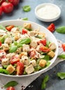 Vegetarian ceasar salad with meat free chicken pieces cherry tomatoes croutons and lettuce in white plate. Royalty Free Stock Photo