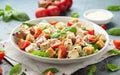 Vegetarian ceasar salad with meat free chicken pieces cherry tomatoes croutons and lettuce in white plate. Royalty Free Stock Photo