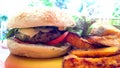 Vegetarian cheeseburger served with sweetpotato chips