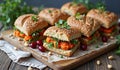 Vegetarian chickpea sandwiches with fresh herbs and sesame seed buns Royalty Free Stock Photo
