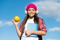 Vegetarian choice. Happy child hold apple on sunny blue sky. Healthy eating habits. Fruit snack. Vegetarian food. School Royalty Free Stock Photo