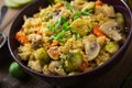 Vegetarian couscous salad with brussels sprouts, mushrooms, carrots and spices. Royalty Free Stock Photo