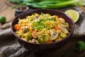 Vegetarian couscous salad with brussels sprouts, mushrooms, carrots and spices. Fitness food. Proper nutrition Royalty Free Stock Photo