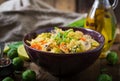 Vegetarian couscous salad with brussels sprouts, mushrooms, carrots and spices Royalty Free Stock Photo