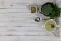 Vegetarian cream of broccoli, potato, onion, garlic, sesame and olive oil, and coconut milk soup. served in a white ceramic plate Royalty Free Stock Photo