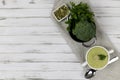 Vegetarian cream of broccoli, potato, onion, garlic, sesame and olive oil, and coconut milk .soup served in a white ceramic plate Royalty Free Stock Photo